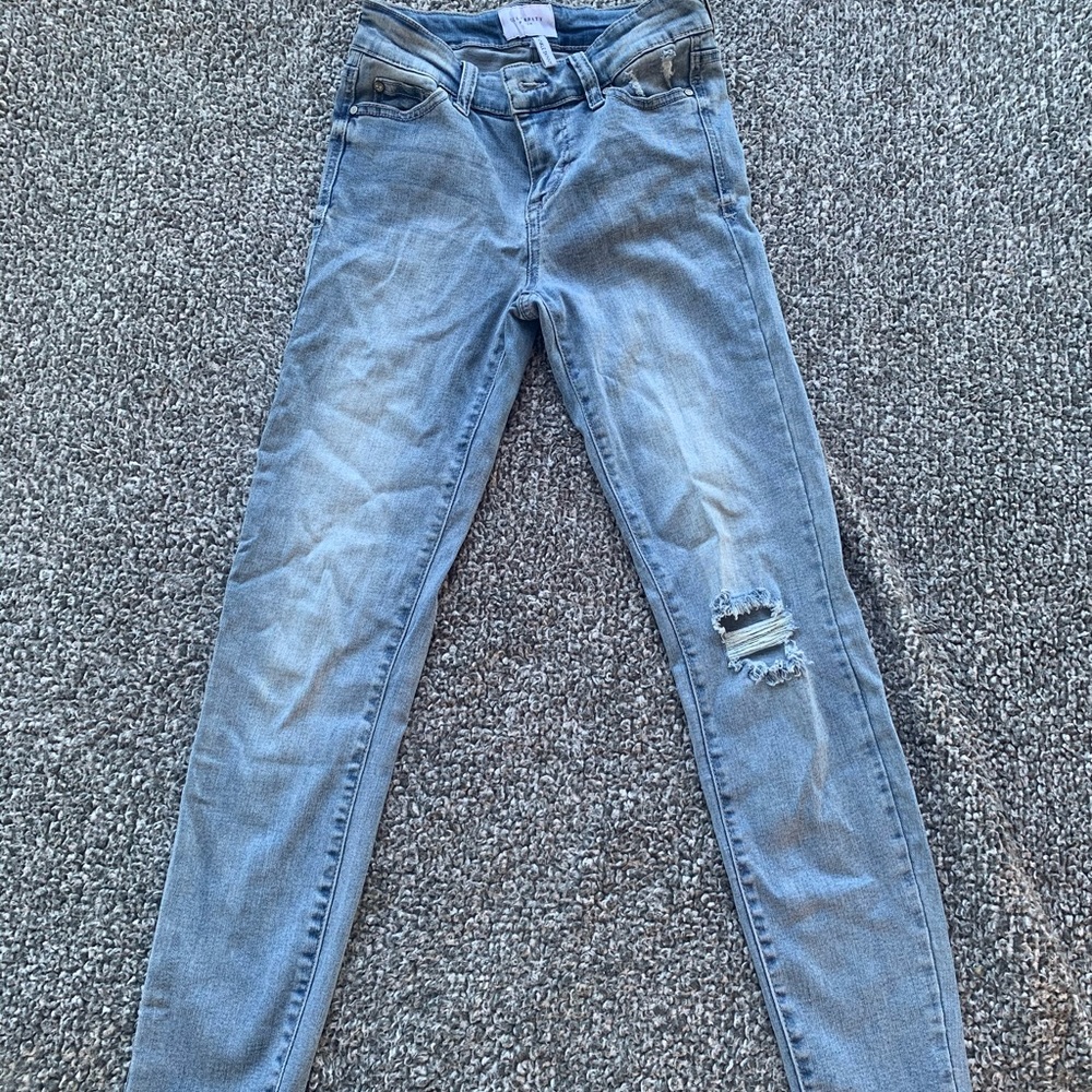 Light denim skinny jeans